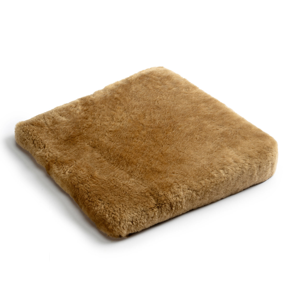 Coussin triangulaire en peau d'agneau, avec rembourrage en mousse