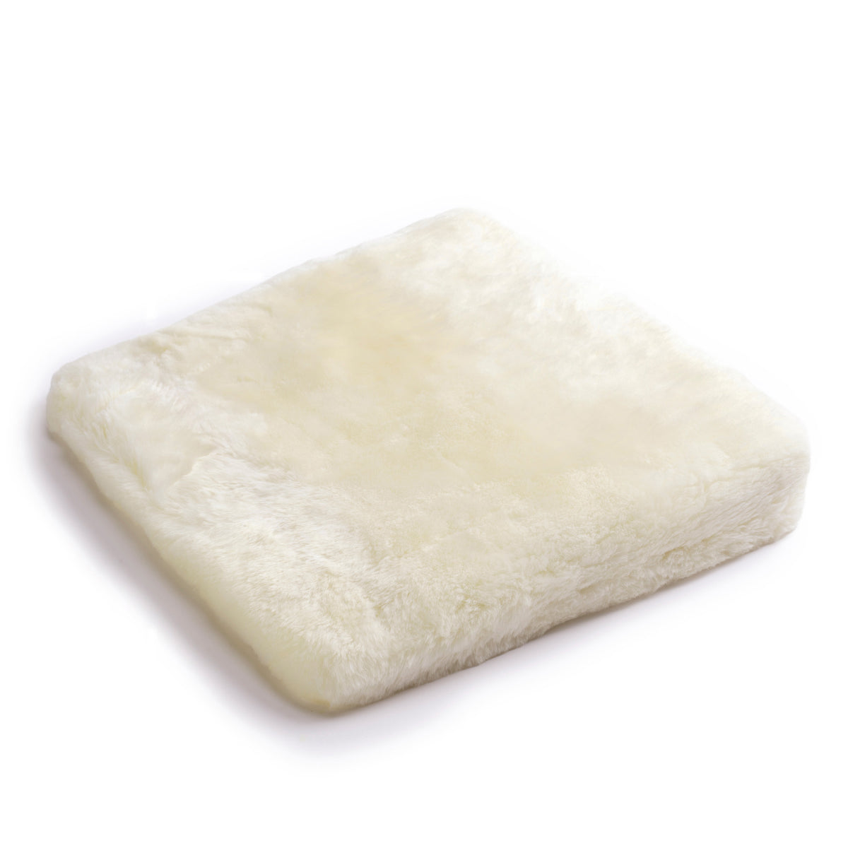 Coussin triangulaire en peau d'agneau, avec rembourrage en mousse