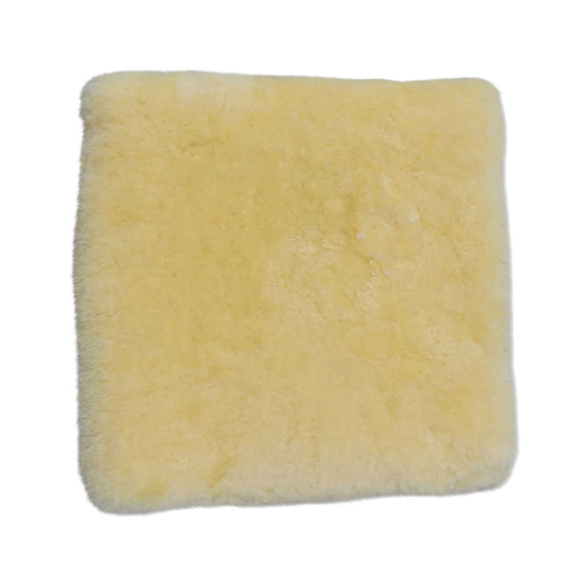 Neuenschwander Lammfell Sitzkissen gold Vorderansicht